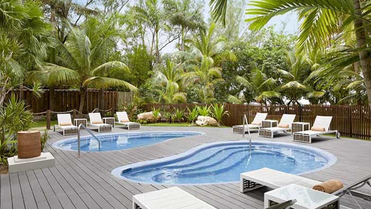 Zoetry Spa by Pevonia outdoor hydrotherapy plunge pools in tropical garden