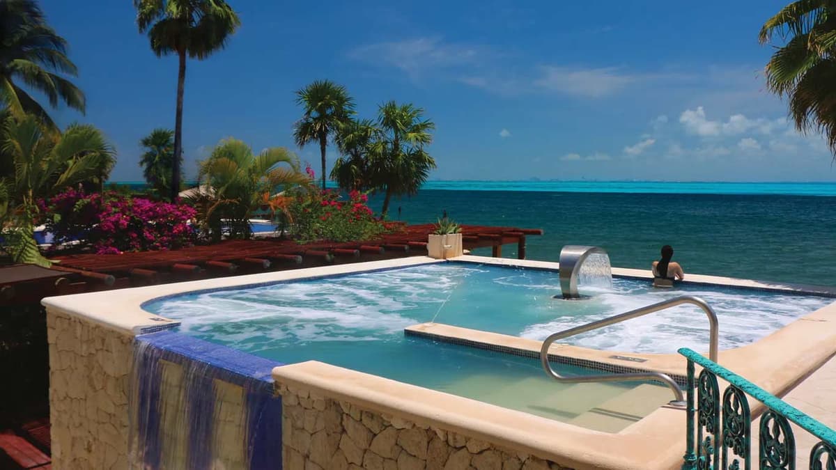 Thalasso seawater hydrotherapy pool with water features overlooking the Caribbean Sea