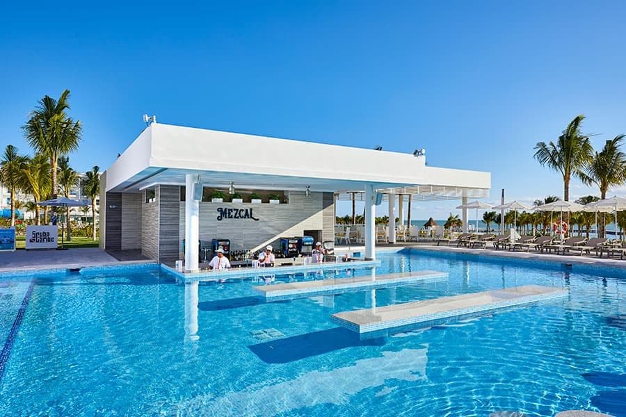 Swimming pool area at Hotel Riu Palace Costa Mujeres