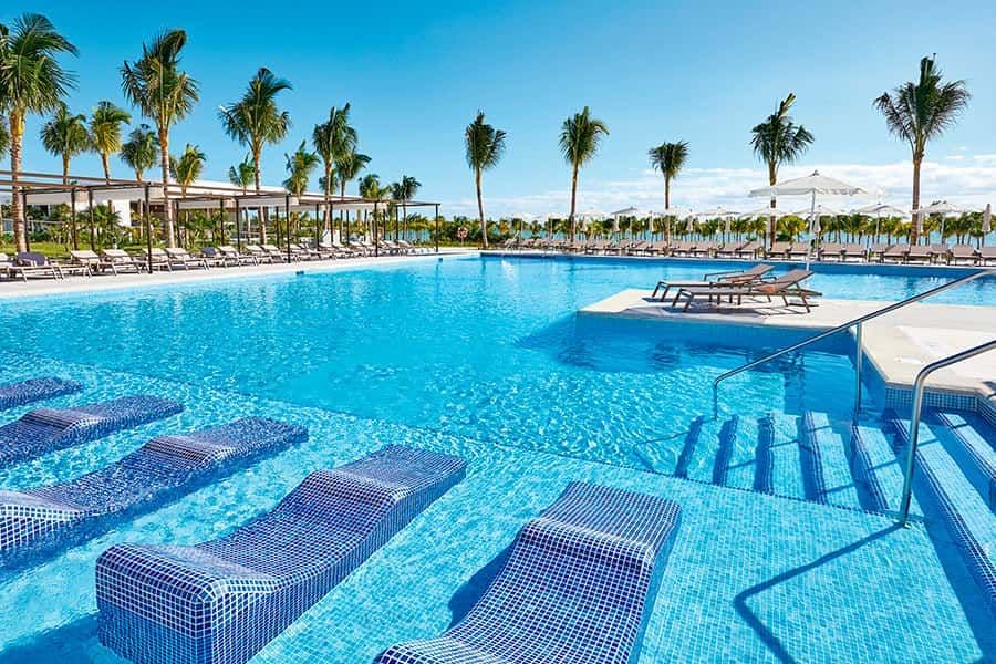 Swimming pool area at Hotel Riu Palace Costa Mujeres