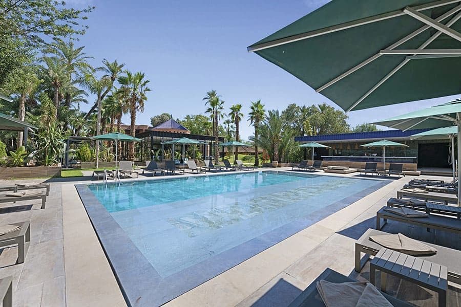 Swimming pool area at Hotel Riu Tikida Garden