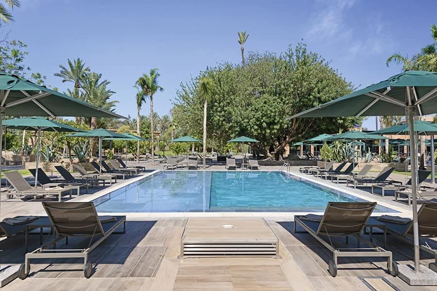 Swimming pool area at Hotel Riu Tikida Garden