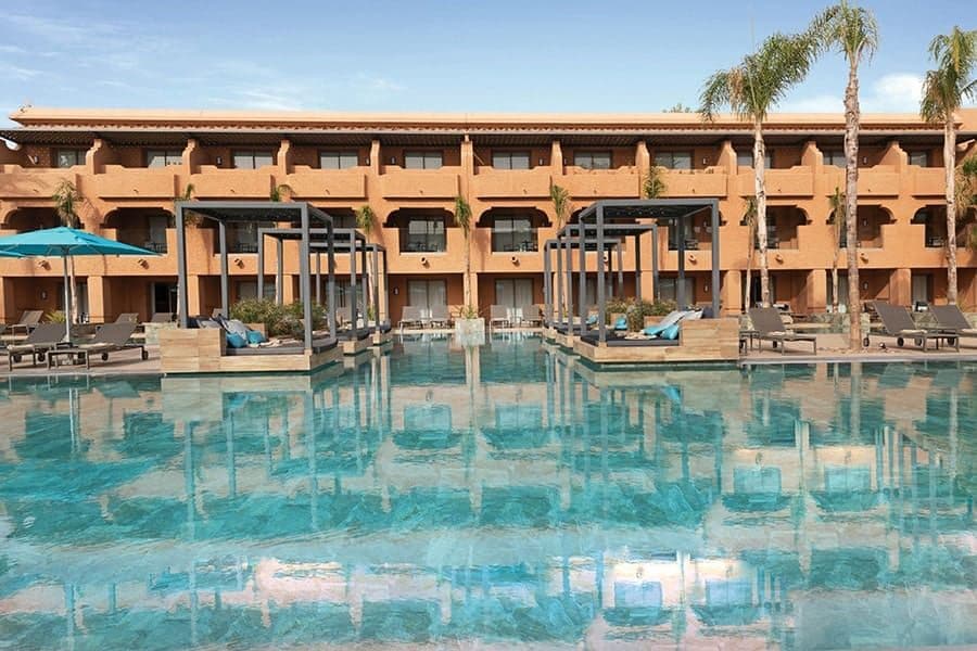 Swimming pool area at Hotel Riu Tikida Garden
