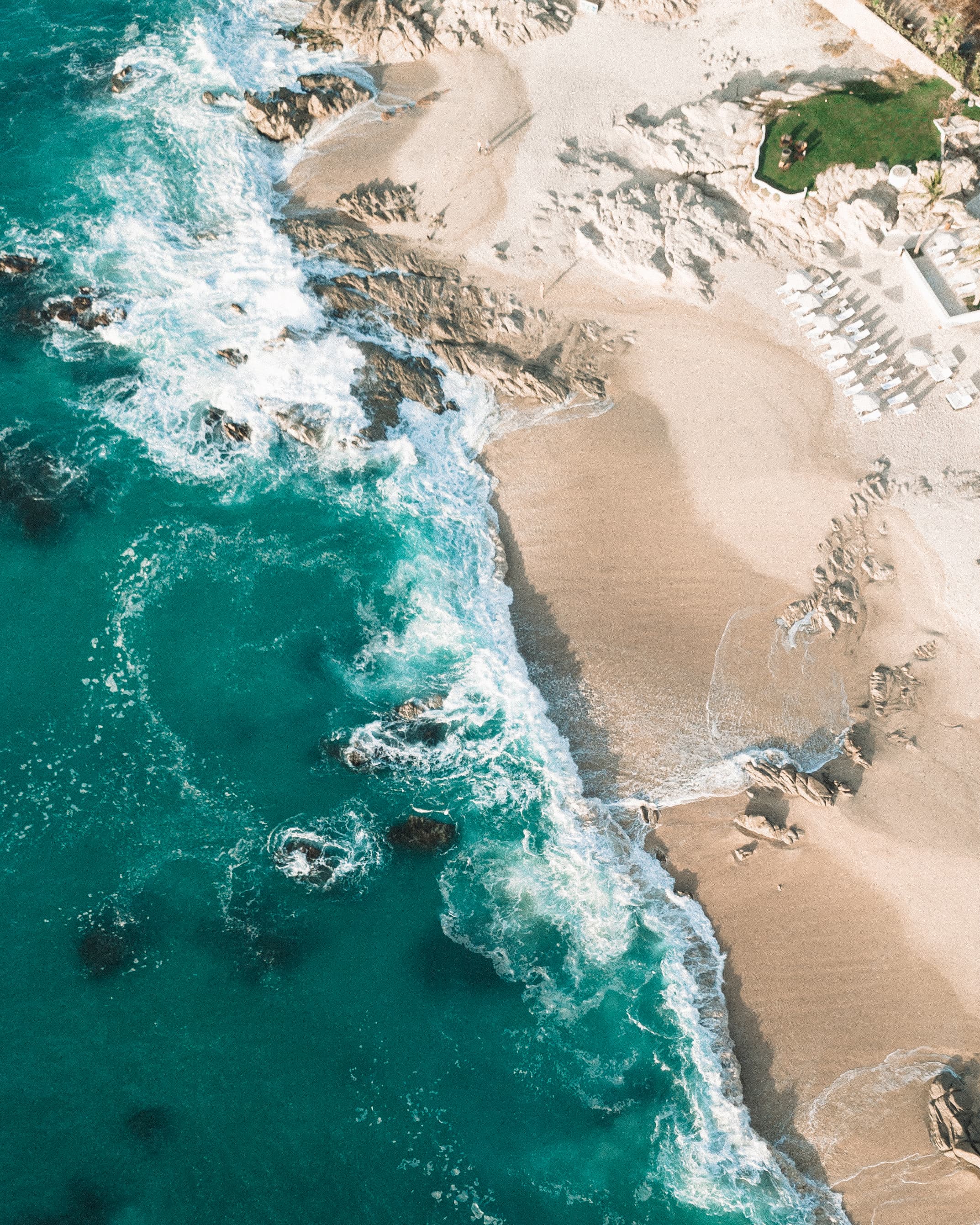 Sea of Cortez beach with loungers and sun shades