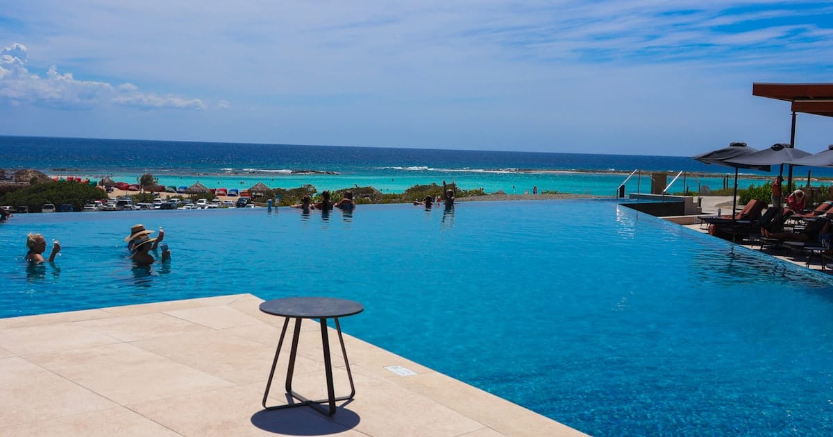 Grand Cayman's Tallest Building Just Opened as a Luxury Resort — With a Rooftop Infinity Pool and Michelin-Level Dining