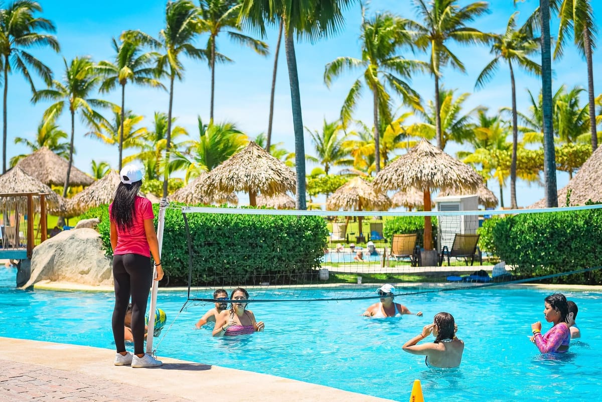 Beachfront activities area with Pacific Ocean views along the volcanic sand coastline