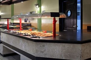 Las Torres main buffet restaurant with international show-cooking stations, themed dinner nights, and expansive seating area