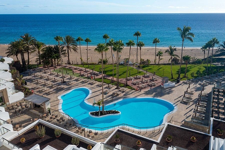 Swimming pool area at Hotel Riu Calypso