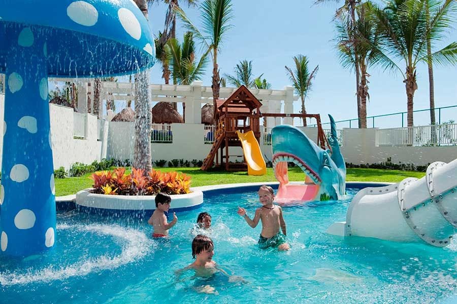 Swimming pool area at Hotel Riu Emerald Bay