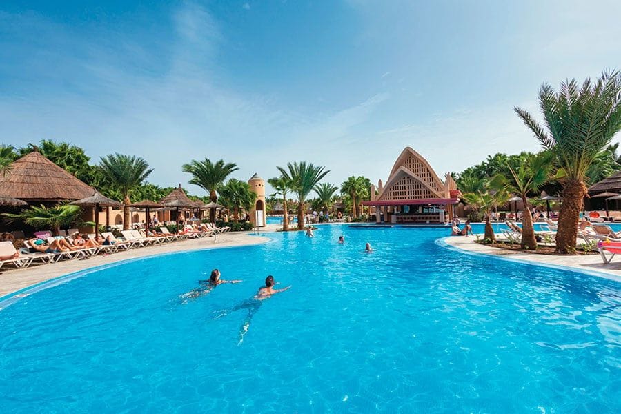Swimming pool area at Hotel Riu Funana