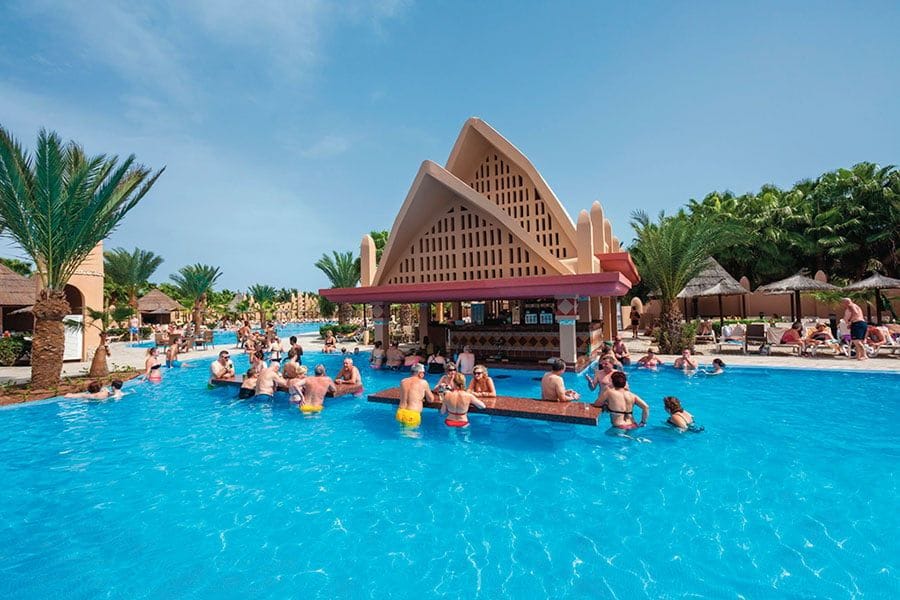 Swimming pool area at Hotel Riu Funana