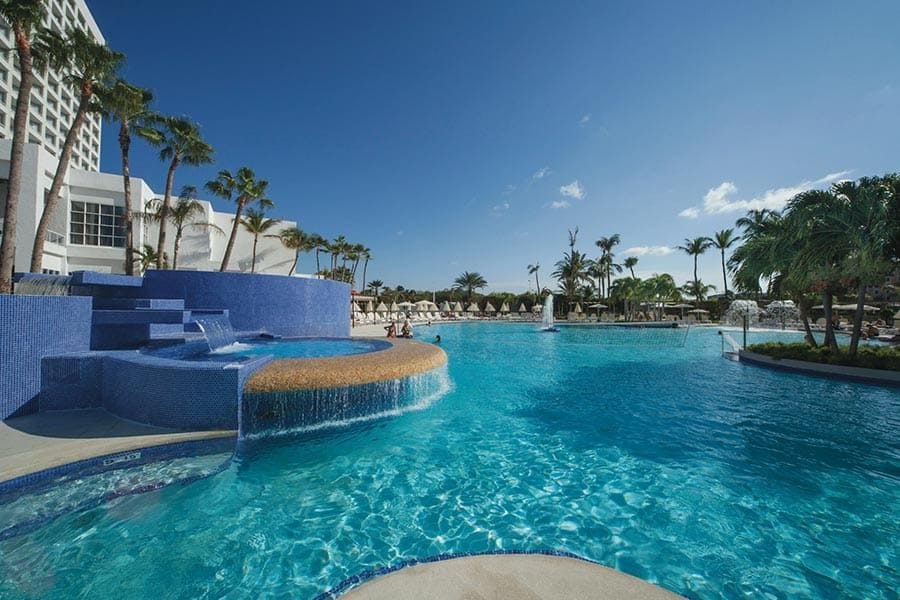 Swimming pool area at Hotel Riu Palace Antillas