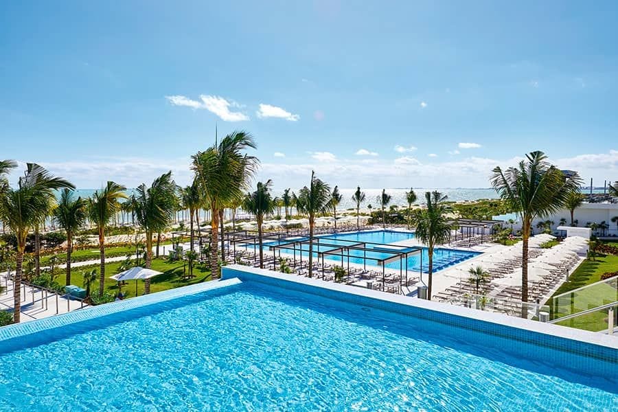 Swimming pool area at Hotel Riu Palace Costa Mujeres