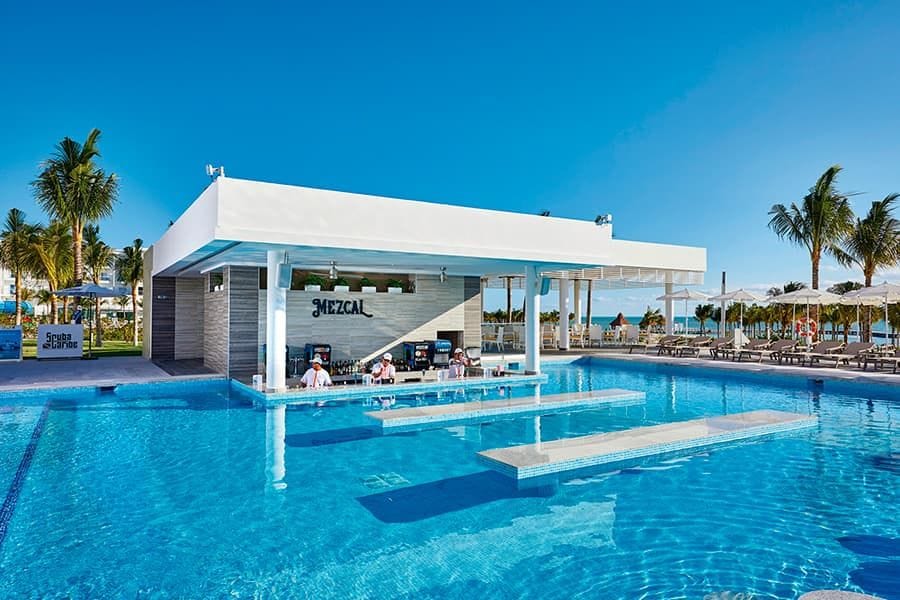 Swimming pool area at Hotel Riu Palace Costa Mujeres