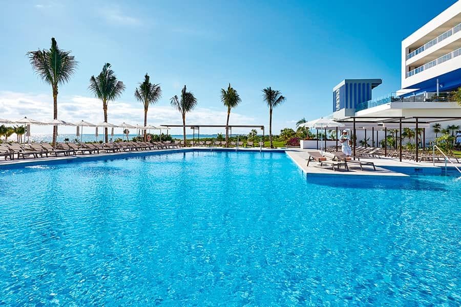 Swimming pool area at Hotel Riu Palace Costa Mujeres