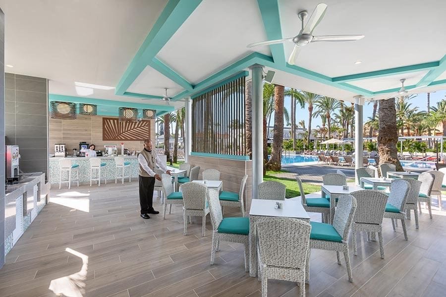Swimming pool area at Hotel Riu Palace Palmeras