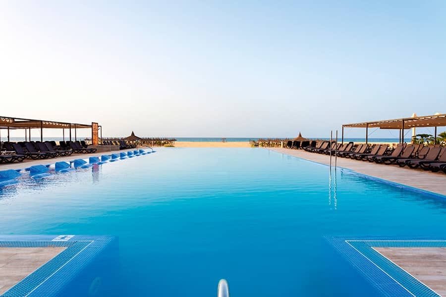 Swimming pool area at Hotel Riu Touareg