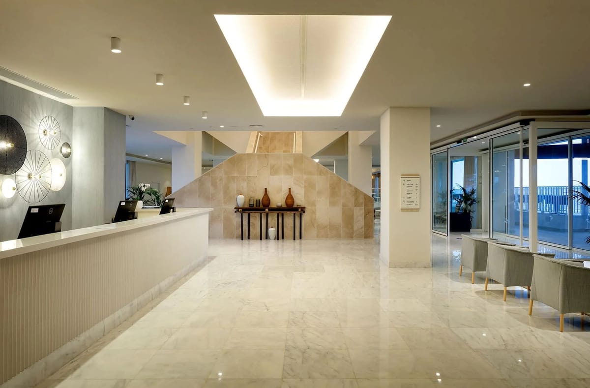 Lobby & bar at Palladium Hotel Menorca, Trademark Collection