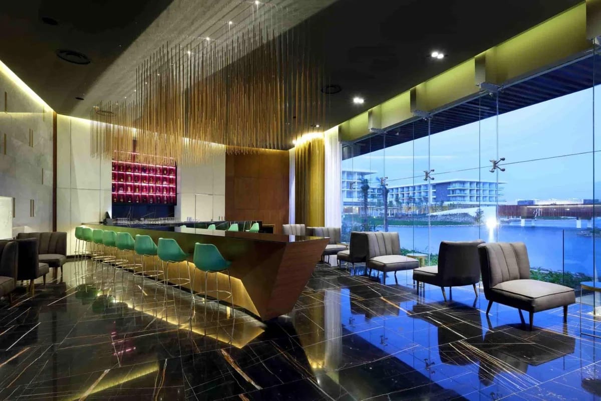 TRS Coral Hotel lobby bar with premium cocktails and sophisticated adults-only atmosphere