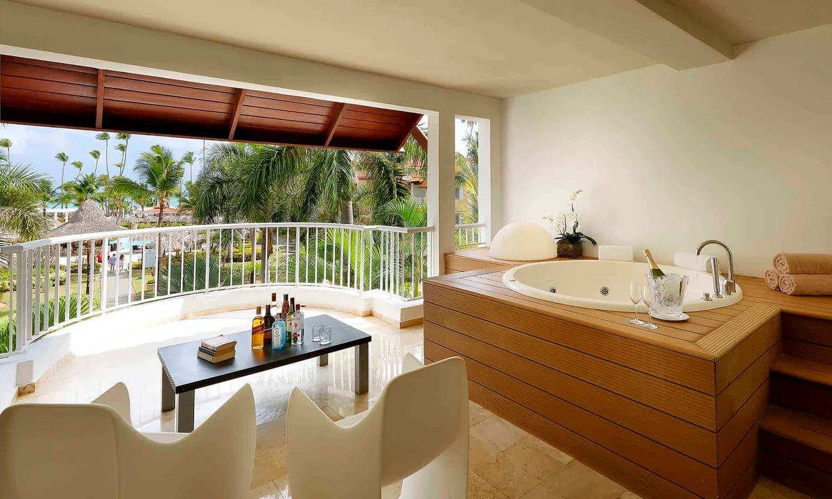 Ambassador Suite — the flagship 970 sq ft suite with terrace jacuzzi and daybed