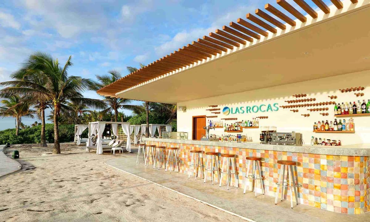 Las Rocas oceanfront area with Caribbean Sea views and Balinese daybeds