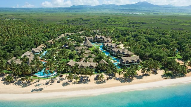 This Adults-Only Resort Lets Guests Roam Its Family-Friendly Twin Next Door